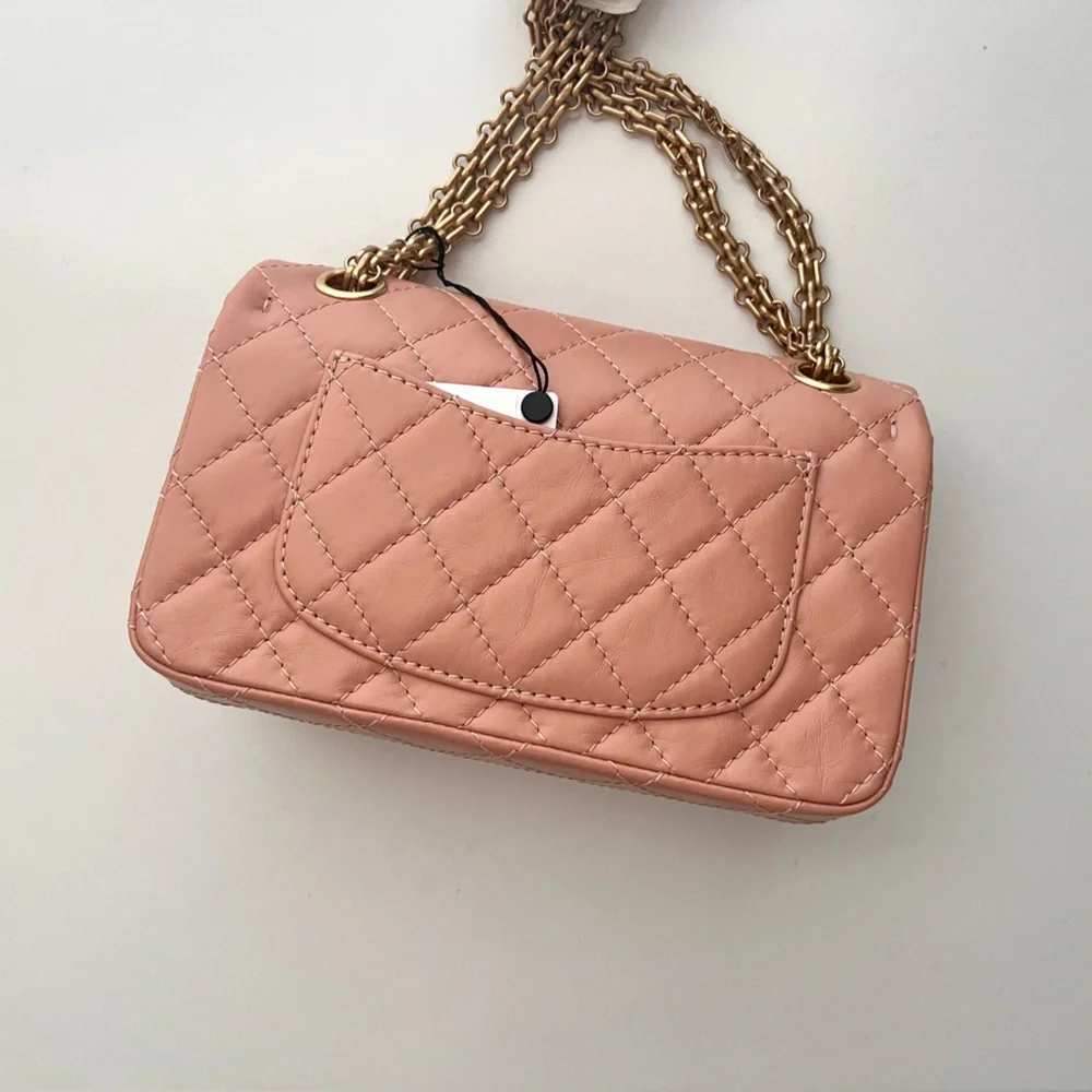 🔥CHANEL Reissue 2.25 Quilted Flap in Peace Pink Aged Calfskin